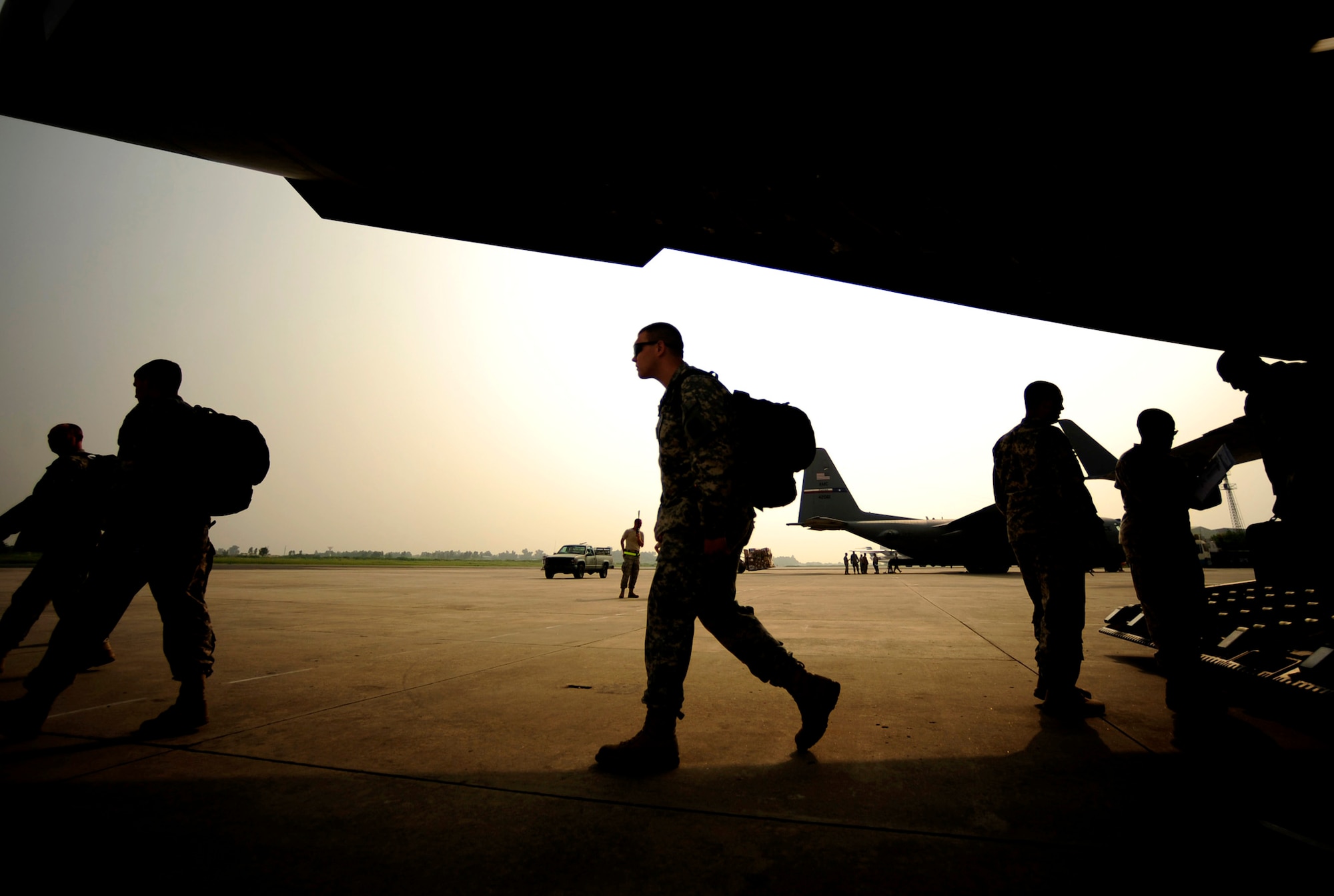 Soldiers from the 16th Combat Aviation Brigade from Fort Wainwright, Alaska, arrive Sept. 1, 2010, at Chaklala Air Force Base, Pakistan, aboard a C-17 Globemaster III aircraft in support of flood relief efforts. (U.S. Air Force photo/Staff Sgt. Andy M. Kin)