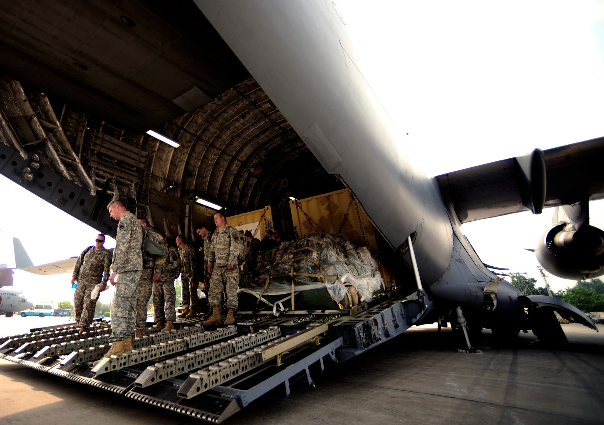 Soldiers from the 16th Combat Aviation Brigade from Fort Wainwright, Alaska, arrive Sept. 1, 2010, at Chaklala Air Force Base, Pakistan, aboard a C-17 Globemaster III aircraft in support of flood relief efforts. The 16th CAB also brought two UH-60 Blackhawk helicopters. (U.S. Air Force photo/Staff Sgt. Andy M. Kin) 