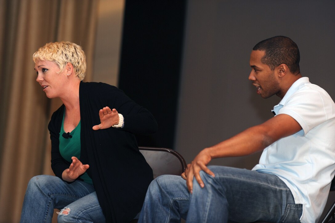 ELLSWORTH AIR FORCE BASE, S.D.-- Courtney Abbott  and DeRante Parker, an acting group from Chicago, Ill,  perform their skit during a "Sex Signals" event here, Sept. 2. The presentation differs from traditional sexual assault prevention programs because it incorporates improvisational education, comedy, and audience interaction to provide a provocative look at dating, sex and the core issue of consent. More than 875 Ellsworth Airmen attended the event. (U.S. Air Force photo/Master Sgt. Loren J. Bonser)