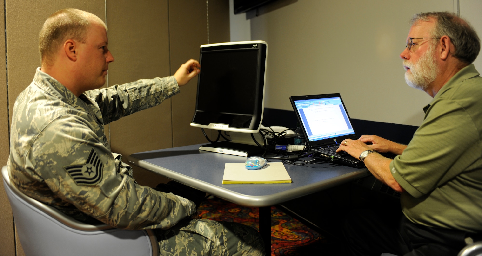 Tech. Sgt. Jeremy Copeland describes his experience Sept. 7, 2010, Eielson Air Force Base, Alaska. Sergeant Copeland was partaking in an important survey to decide the layout style of the new Air Force website. Sergeant Copeland is the Medical logistics NCO in charge assigned to the 354th Medical Group. (U.S. Air Force photo/Senior Airman Willard E. Grande II)