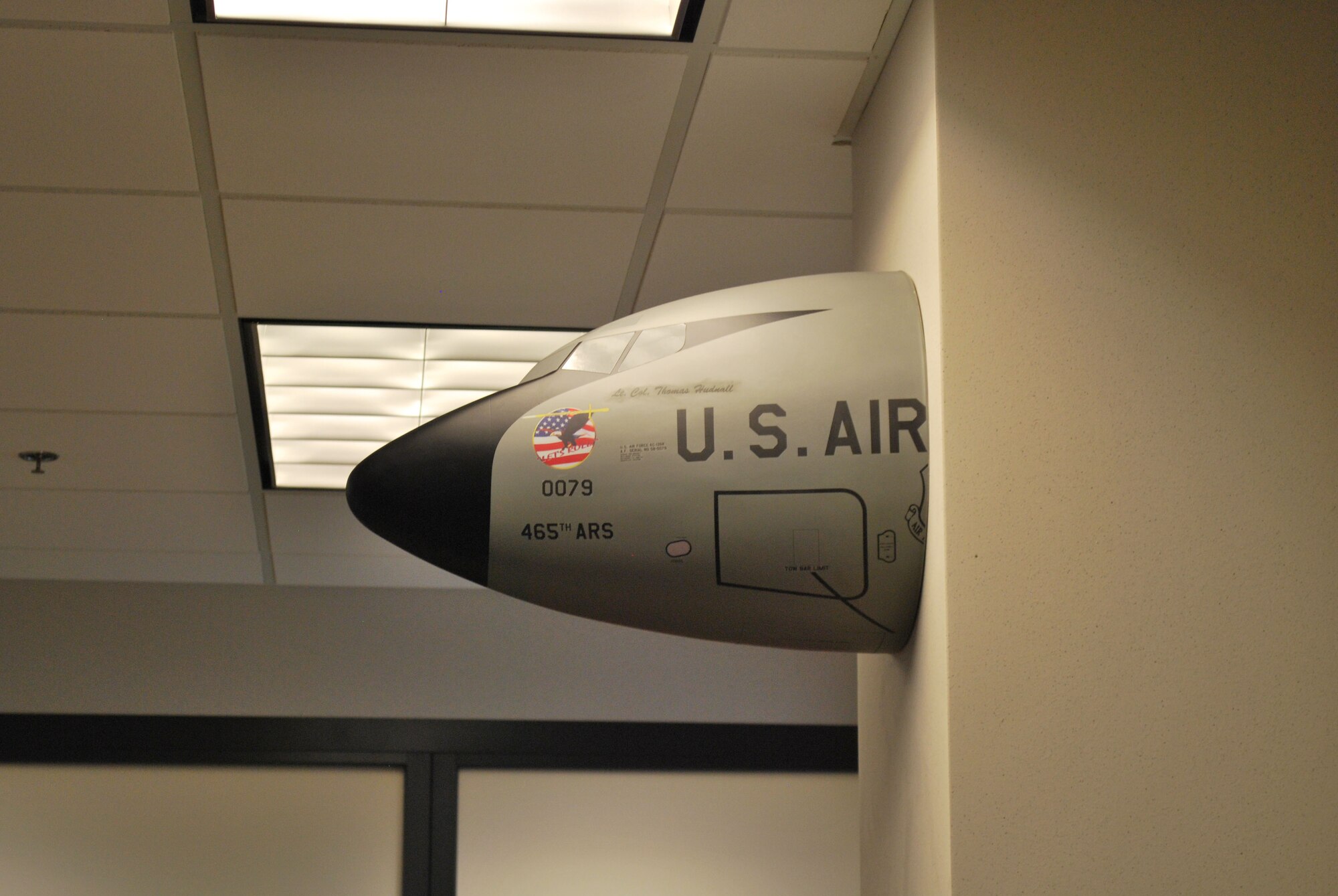 One of the first things visitors will see upon entering the new consolidated squadron operations building is a model nose of a KC-135 Stratotanker aircraft hangs off a wall in the new consolidated operations building. (U.S. Air Force photo by Lt. Col. Richard Curry