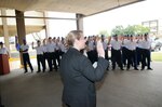 Erin Conaton, Under Secretary of the Air Force , administers the oath to an Air Force Trainee graduating class. Secretary Conaton visited Sept. 3 to acknowledge Lackland Air Force Base and the Wilford Hall Hospital mission.  (U.S. Air Force photo by Joel Martinez)