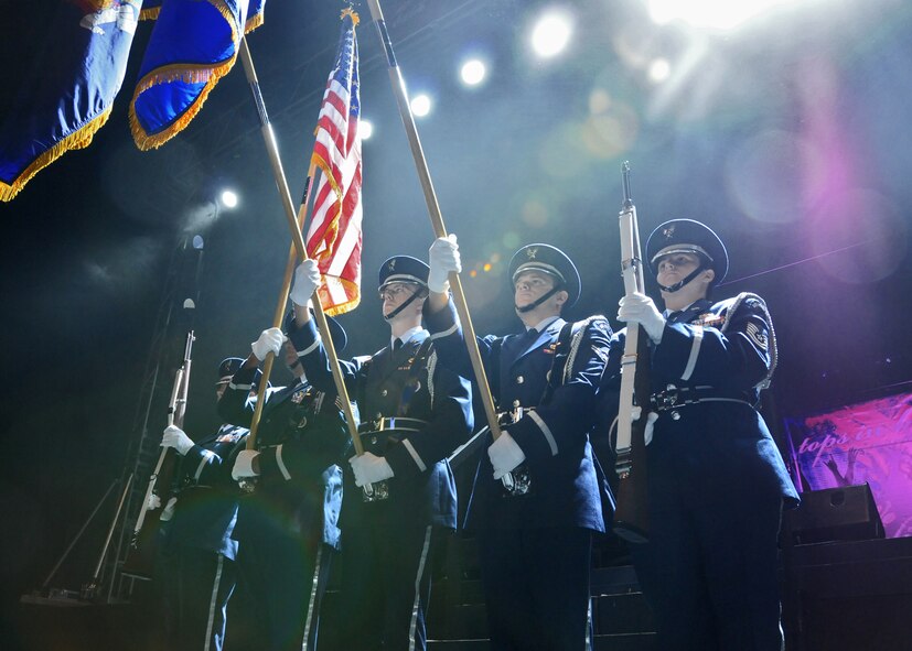 The Niagara Falls Air Reserve Color Guard opens for Tops in Blue with the presentation of colors September 4, 2010, Artpark Lewiston, N.Y. Tops in Blue is made up of active-duty Airmen from all over the Air Force, from the performers and backstage crew to the sound and video technicians. Before the 2010 tour ends, Tops in Blue will complete more than 100 shows in 25 countries. (U.S. Air Force photo by Staff Sgt. Joseph McKee)