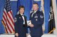 Technical Sergeant Michael W. Parsons, a member of the 164th Airlift Wing Security Forces Squadron, recieves a distinguished graduate award during the graduation ceremony for class 10-7 from the NCO Academy at Brown Air National Guard Training and Education Center, McGhee Tyson Air National Guard Base, Knoxville, TN.