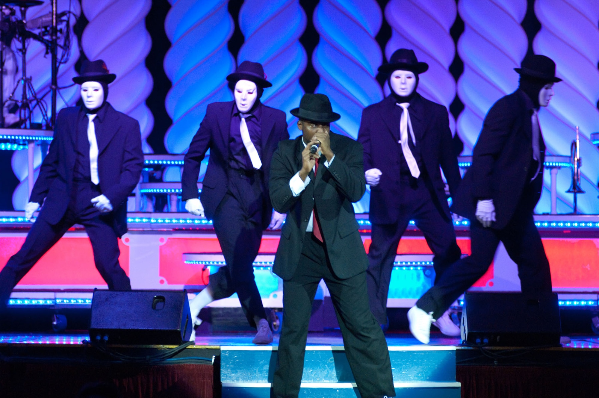 LOWELL, Mass. – Senior Airman Adam Rideaux (center) beatboxes the tunes of some of Michael Jackson’s greatest hits during the Tops in Blue show at Lowell Memorial Auditorium on Sept. 1. Airman Rideaux was one of many Airmen who competed in a multilevel competition for the right to be selected as a member of the Tops in Blue organization. (U.S. Air Force photo by Rick Berry)