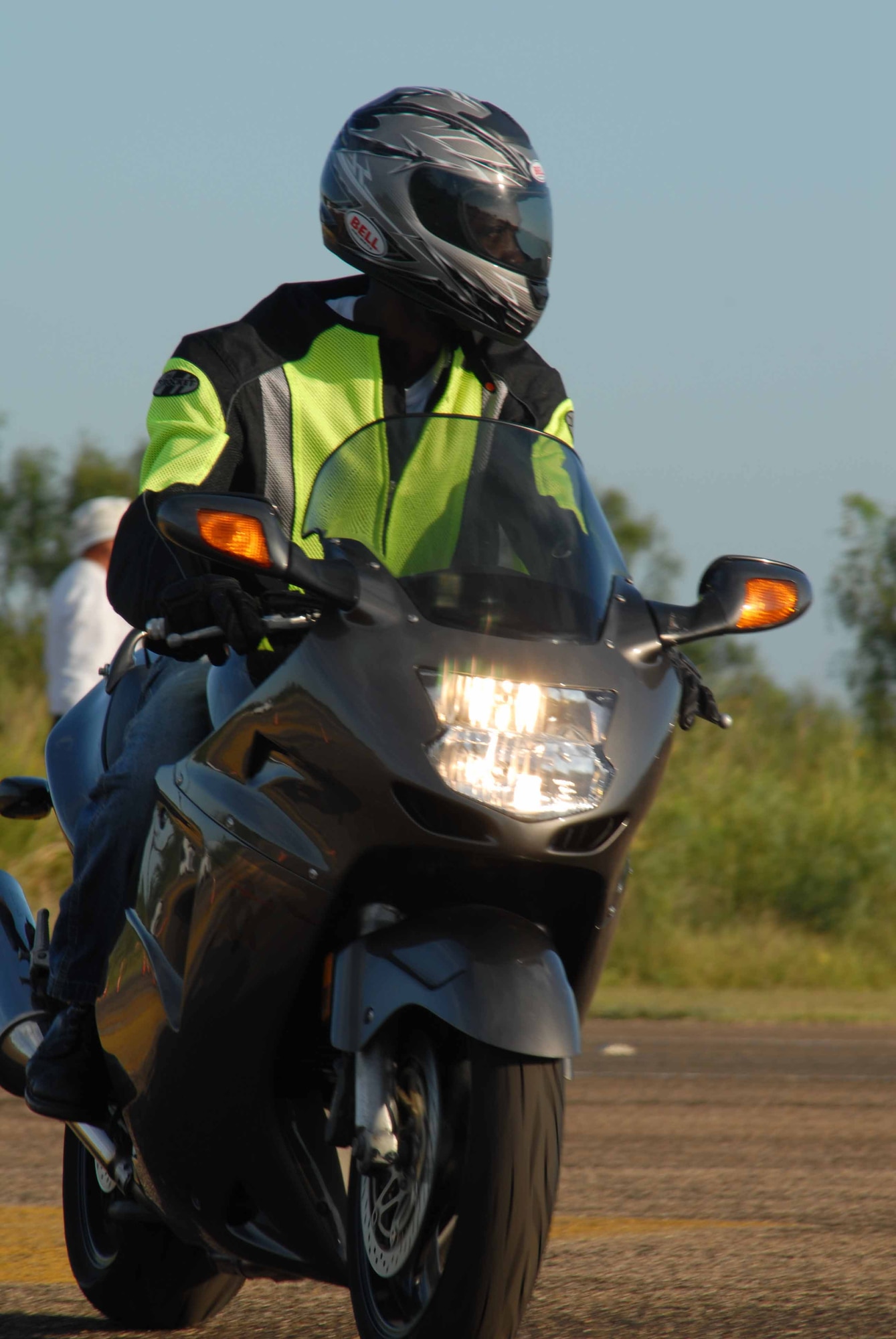 GOODFELLOW AIR FORCE BASE, Texas -- Gerald Brown, 315th Training Squadron, looks before making a turn, during a Experienced Riders Course on base Aug. 22. A cyclist of more than 20 years, the course was Mr. Brown's first ERC, a program motorcyclists of all experience levels are encouraged to take. Riders practice clutch control, pause and go’s, and weaving around and over obstacles in a controlled environment. The course is taught by Southwest Motorcycle Trainer of San Antonio. For more information, contact a unit motorcycle safety representative. (U.S. Air Force photo/ Senior Airman Tong Duong) 