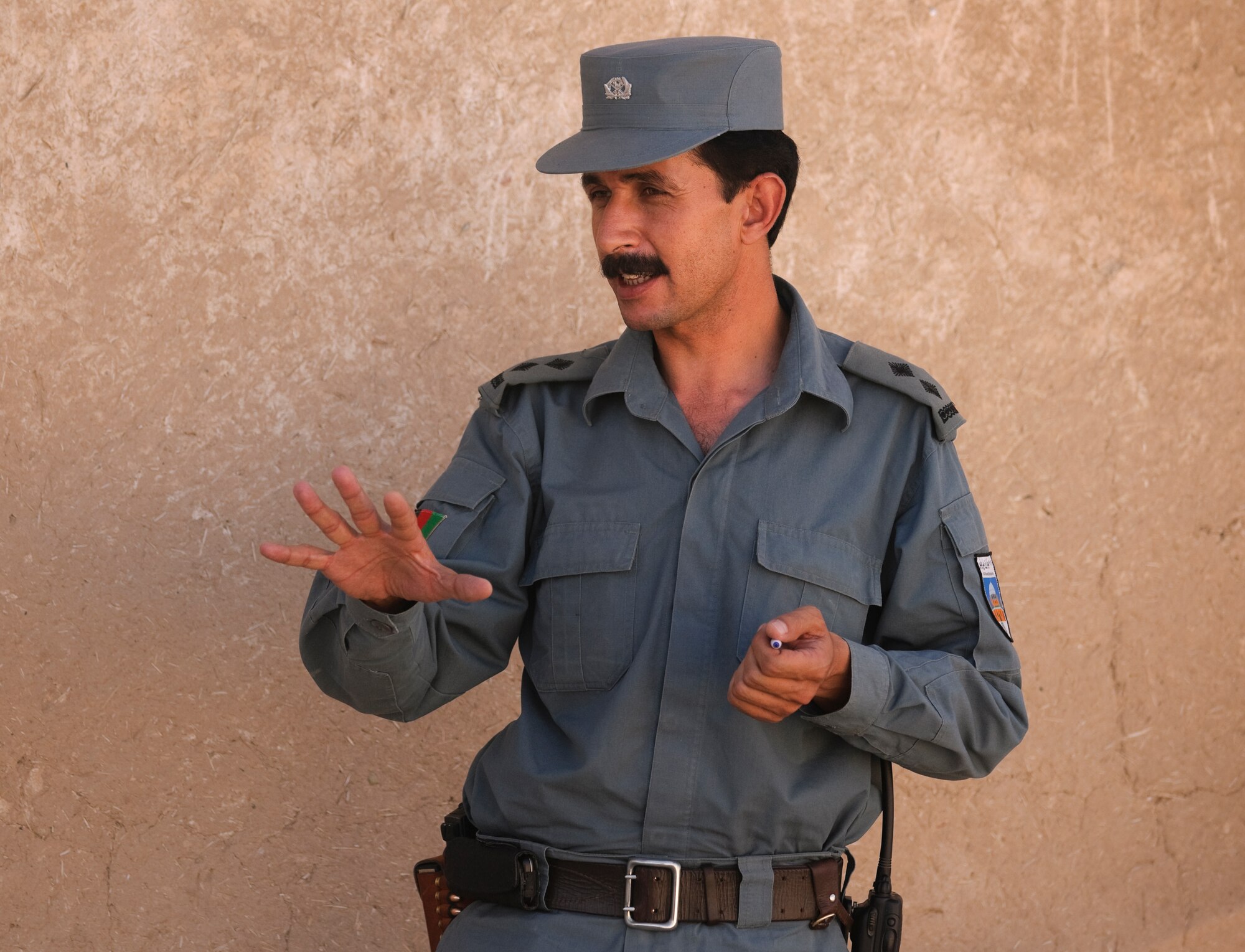 FORWARD OPERATING BASE BULLARD, Afghanistan - Shah Joy District Police Chief Sardar Mohammed speaks to local elders during a shura near Forward Operating Base Bullard, Shah Joy District, Zabul province, Sept. 2. Mohammed spoke about security in the area during the shura. (U.S. Air Force photo/Senior Airman Nathanael Callon/Released) 

