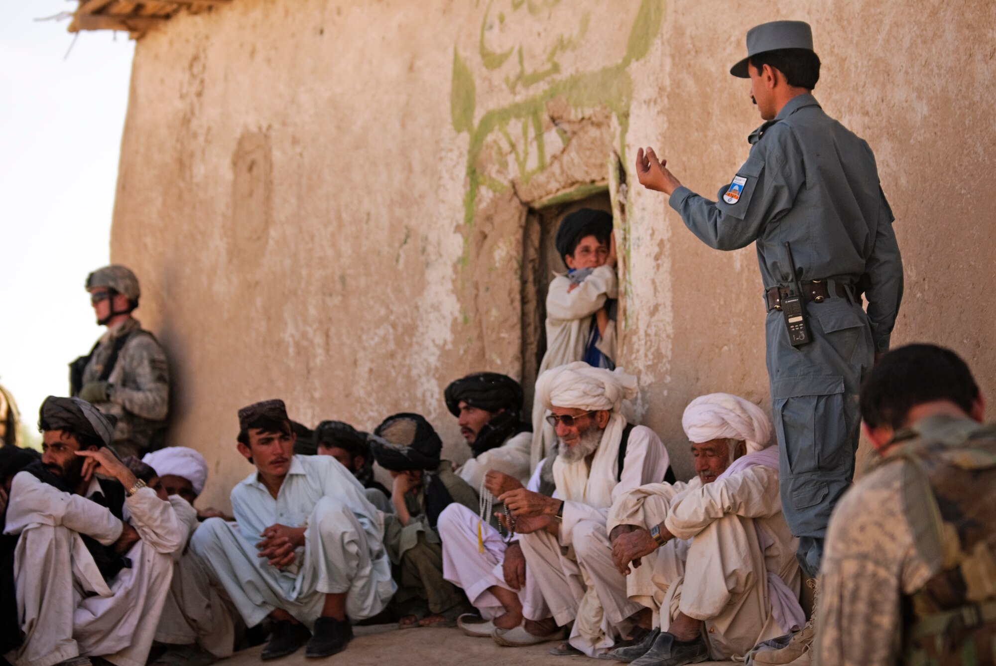 FORWARD OPERATING BASE BULLARD, Afghanistan - Shah Joy District Police Chief Sardar Mohammed speaks to local elders during a shura near Forward Operating Base Bullard, Shah Joy District, Zabul province, Sept. 2. Mohammed spoke about security in the area during the shura. (U.S. Air Force photo/Senior Airman Nathanael Callon/Released) 
