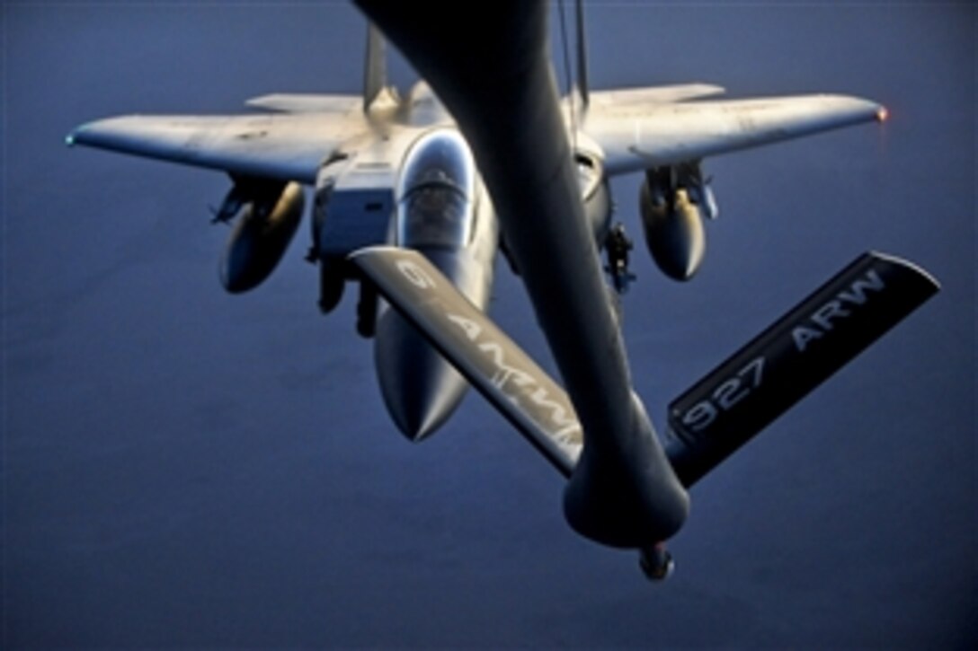 A U.S. Air Force F-15 Strike Eagle maneuvers into position to receive fuel from a KC-135 Stratotanker while flying over Afghanistan to support Operation Enduring Freedom, Sept. 8, 2010.