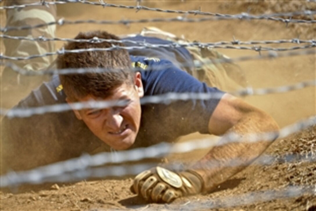 U.S. Navy Chief Petty Officer Gabriel Paine competes in the annual Chief Selectee Fleet Marine Force Challenge on the Marine Corps obstacle course on Kaneohe Marine Corps Base, Hawaii, Sept. 2, 2010. Paine is a intelligence specialist assigned to Commander, Submarine Force U.S. Pacific Fleet.