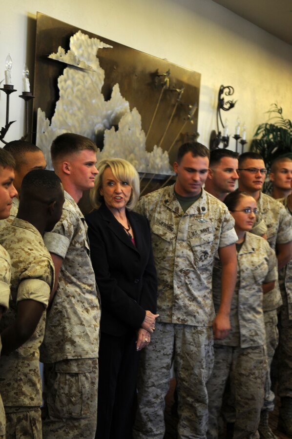 Arizona Governor, Jan Brewer, speaks with a group of Marines at the Marine Corps Air Station in Yuma, Ariz., Sept. 5, 2010. Brewer attended the Arizona Commander’s Summit which gives military installation commanders from across the state an opportunity to share information on upcoming plans and events for their respective installations. “I came to listen, to learn and see what we can do and remind all of you that we appreciate the sacrifices that you make,” said Brewer.