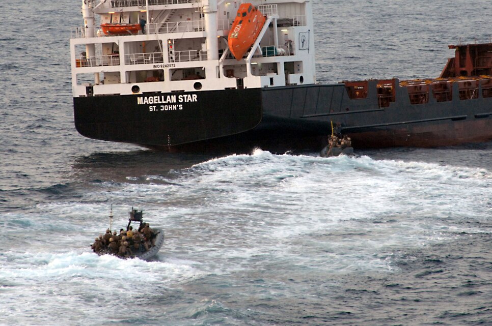 Marines assigned to the 15th Marine Expeditionary Unit, Maritime Raid Force, approach the motor vessel Magellan Star Thursday, Sept. 9 to recover it from suspected pirates. The Marines boarded the vessel and took nine suspected pirates into custody. The pirates were taken to the guided-missile cruiser USS Princeton (CG 59) and the ship's eleven crew members resumed control of Magellan Star. Pirates took control of the ship Sept. 8. Dubuque is part of the Peleliu Amphibious Ready Group, supporting maritime security operations and theater security cooperation efforts in the U.S. 5th Fleet area of responsibility.