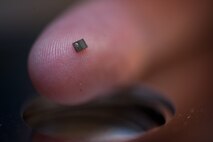 A hard drive read/write head at the Defense Computer Forensic Laboratory Sept. 9, 2010, in Linthicum, Md. Read/write heads ride on a microscopic layer of air that develops on the surface of the platter(s), some that spin up to 10,000 rotations per minute inside a hard drive. The slightest touch of a head onto a platter disk will cause physical damage and render that side of the disk unreadable. (U.S. Air Force photo/Lance Cheung)