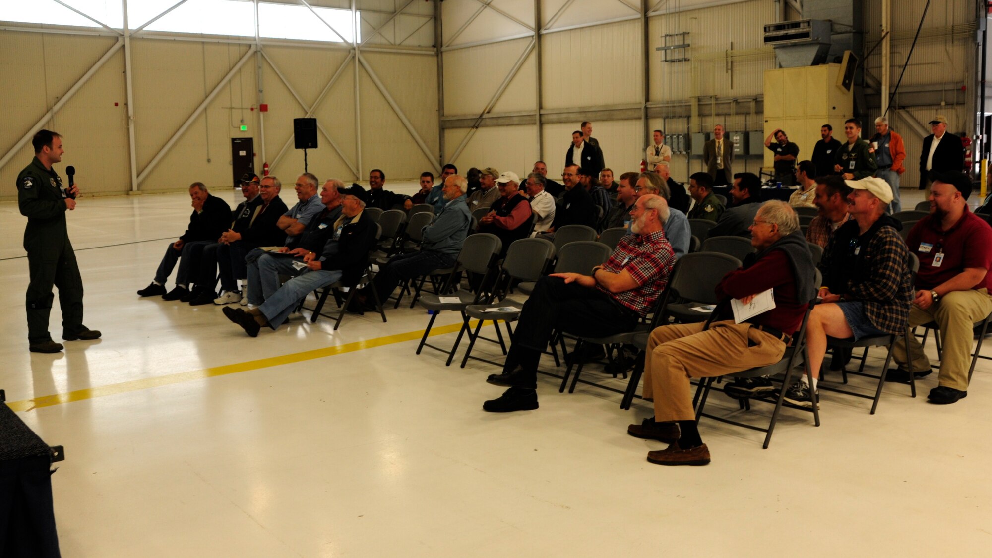 Capt. Zachary Dorman, 62nd Airlift Wing flight safety officer and Joint Skies Seminar lead organizer, speaks to a group of Joint Skies attendees Sept. 9 at Joint Base Lewis-McChord, Wash. The program will help establish a new link to aviation programs, information and ideas across the region. (U.S. Air Force Photo/Airman Leah Young)