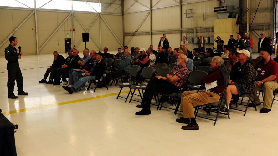 Capt. Zachary Dorman, 62nd Airlift Wing flight safety officer and Joint Skies Seminar lead organizer, speaks to a group of Joint Skies attendees Sept. 9, 2010, at Joint Base Lewis-McChord, Wash. The program will help establish a new link to aviation programs, information and ideas across the region. (U.S. Air Force Photo/Airman Leah Young) 