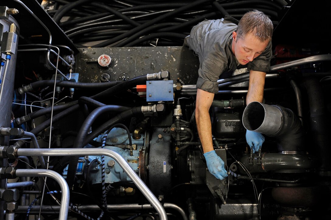 ELLSWORTH AIR FORCE BASE, S.D. - Airman 1st Class Robert Lyde, 28th Maintenance Squadron aerospace ground equipment technician, performs a phase two inspection on a hydraulic test stand, Sept. 7.  Aerospace ground equipment technicians service, inspect, troubleshoot, repair and perform preventive maintenance on motor and engine-driven generator sets, air conditioners, hydraulic test stands, air compressors, bomb lifts, heaters and other similar support equipment. (U.S. Air Force photo/Staff Sgt. Marc I. Lane)