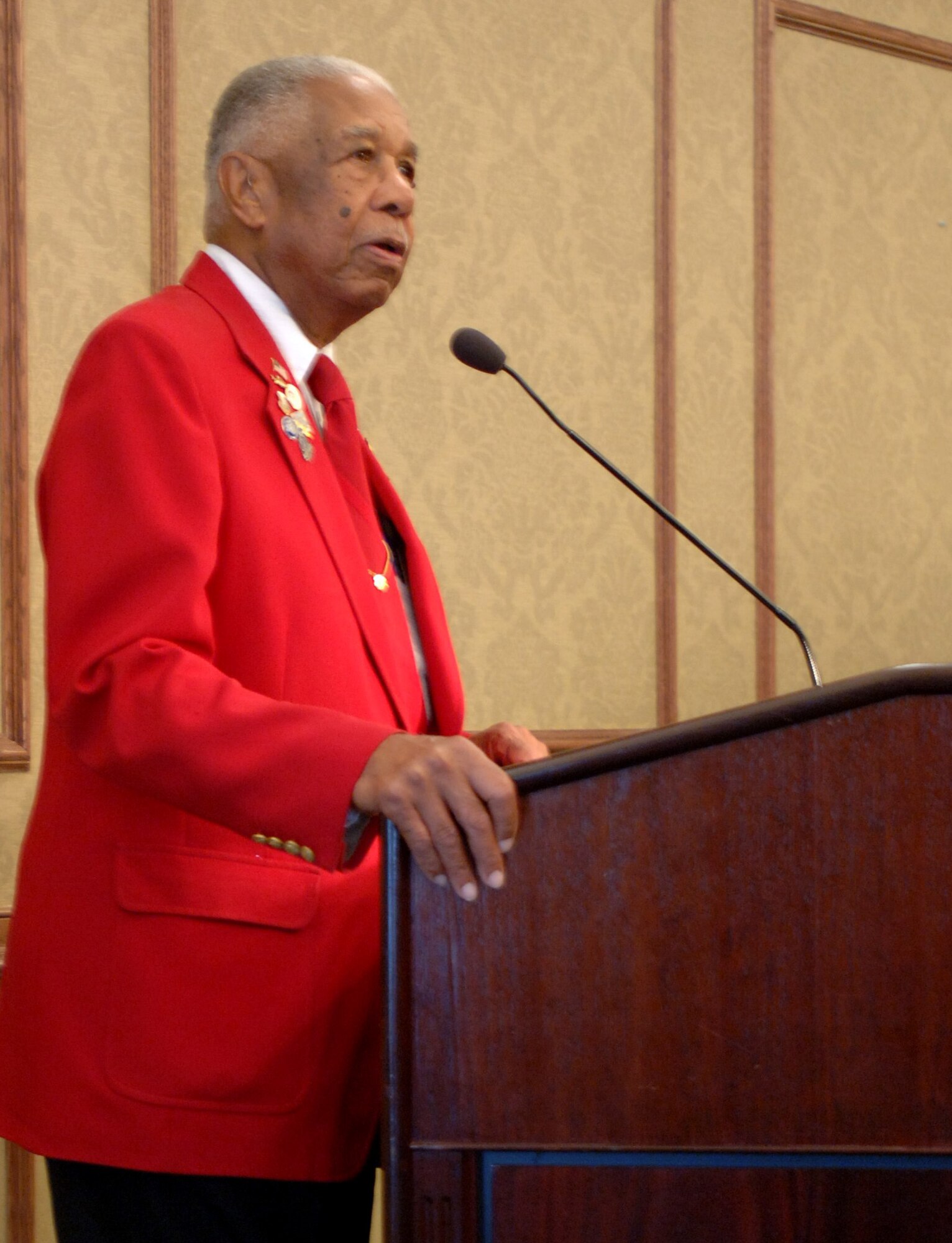 LANGLEY AIR FORCE BASE, Va. -- Retired Chief Master Sgt. Grant S. Williams, Sr., a Documented Original Tuskegee Airman, speaks to the audience during his induction into the Langley Chief’s Room at the Bayside Enlisted Club Sept. 9. Williams is only the Chief’s Room’s second inductee, behind retired Chief Master Sgt. Bill Christie, that did not serve as Chief Master Sergeant of the Air Force. (U.S. Air Force photo/Airman 1st Class Jason J. Brown) (RELEASED)