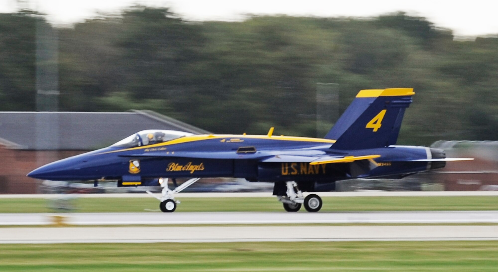 Blue Angel's #4 jet lands and taxis down the flightline at Scott Air Force Base Sept. 9. Scott AFB is hosting the Airpower  Over the Midwest air show which is expected to draw nearly 90,000 people from the surrounding community during Saturday and Sunday's events. (U.S. Air Force photo/ Staff Sgt. Ryan Crane)
