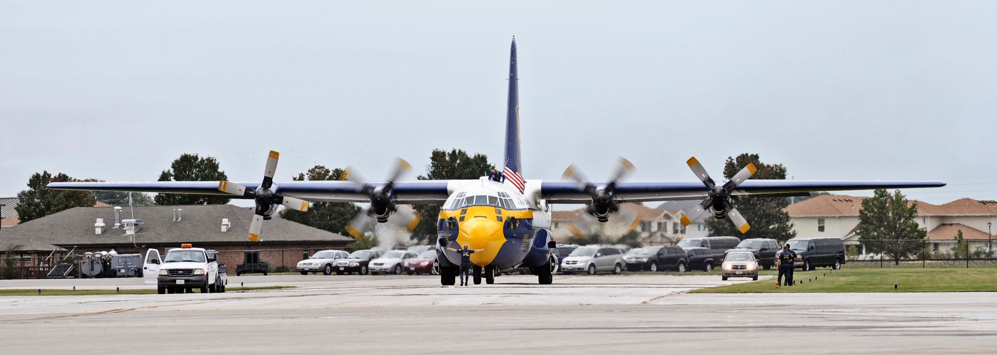 The Blue Angel's C-130, Fat Albert, arrives to Scott Air Force Base with all the crew involved with the Blue Angel's show Sept. 9. Scott AFB is hosting the Airpower  Over the Midwest air show which is expected to draw nearly 90,000 people from the surrounding community during Saturday and Sunday's events. (U.S. Air Force photo/ Staff Sgt. Ryan Crane)