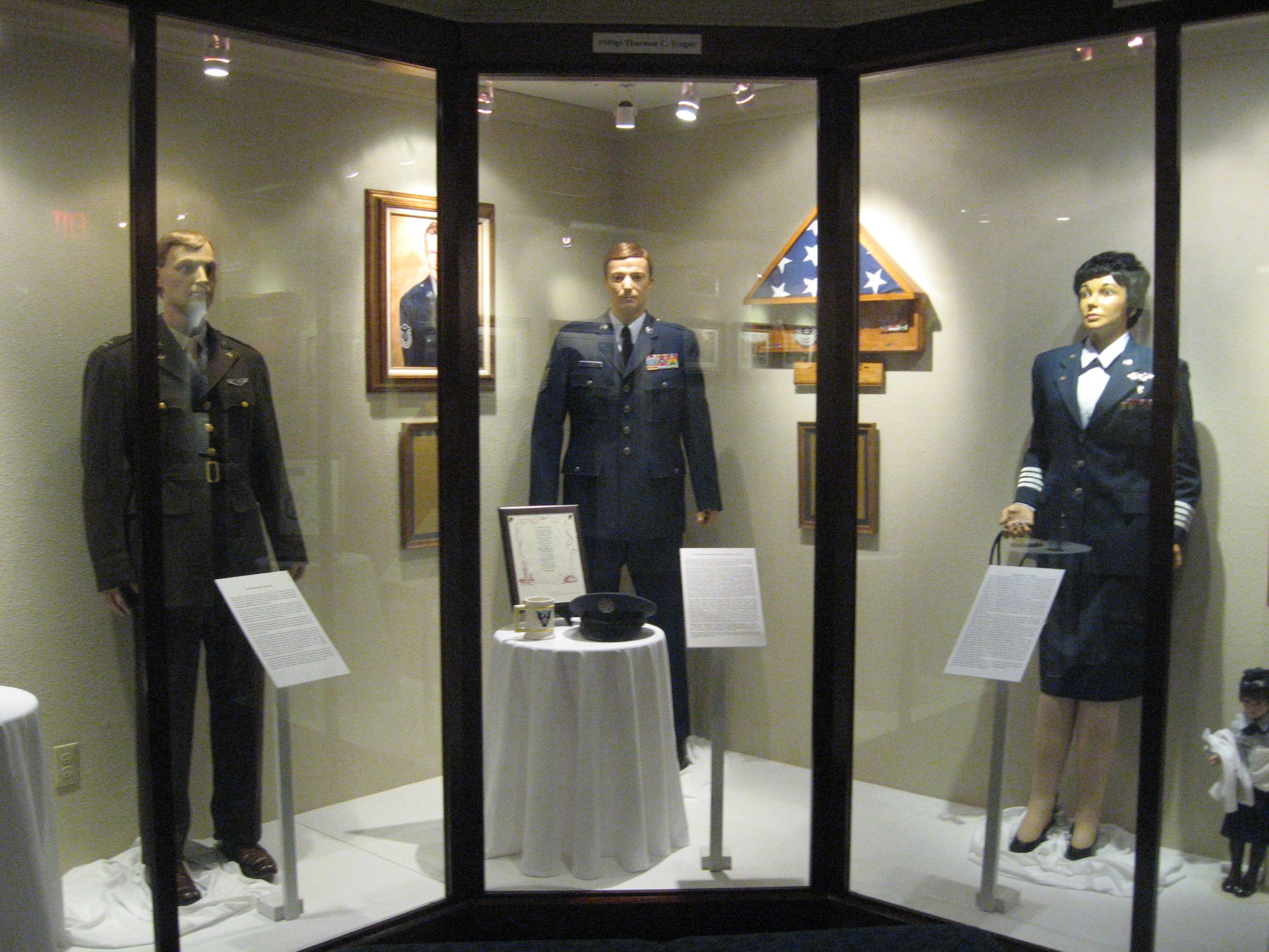 The Sheppard Hall of Heroes in the Heritage Center at Sheppard Air Force
Base, Texas, honors three former Airmen for their service from World War II
to Desert Storm.  Col. Rita Vokes, Maj. Wayne Kuschel and Senior Master Sgt.
Thurman Teague donated items for the display dedicated on May 21.
(U.S. Air Force photo/Debi Smith)
