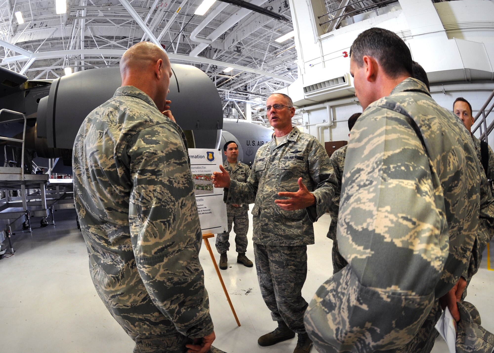 Lt. Gen. Robert Allardice, 18th Air Force commander, discusses current maintenance operations with Col. Allan Day (far left), 22nd Maintenance Group commander, Sept. 8, 2010, McConnell Air Force Base, Kan.  General Allardice visited McConnell key facilities to familiarize himself with local base practices and met with wing leadership to recognize Airmen’s accomplishments.  This is General Allardice’s first time to McConnell since becoming the 18th Air Force commander.  (U.S. Air Force photo/Airman 1st Class Andrea Salazar)