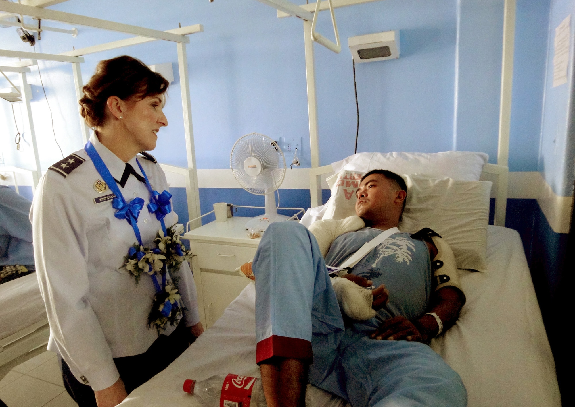 Maj. Gen. Kimberly Siniscalchi visits a patient in the orthopedic ward at the Armed Forces of the Philippines medical center Aug. 29, 2010, in Manila, Philippines, during the 4th annual Asia-Pacific Nursing Conference Symposium, where more than 200 nurses from 13 countries were in attendance. General Siniscalchi is the assistant Air Force Surgeon General of Medical Force Development and Nursing Services, at the Office of the Surgeon General. (U.S. Air Force photo/Tech. Sgt. Carlos Limo)