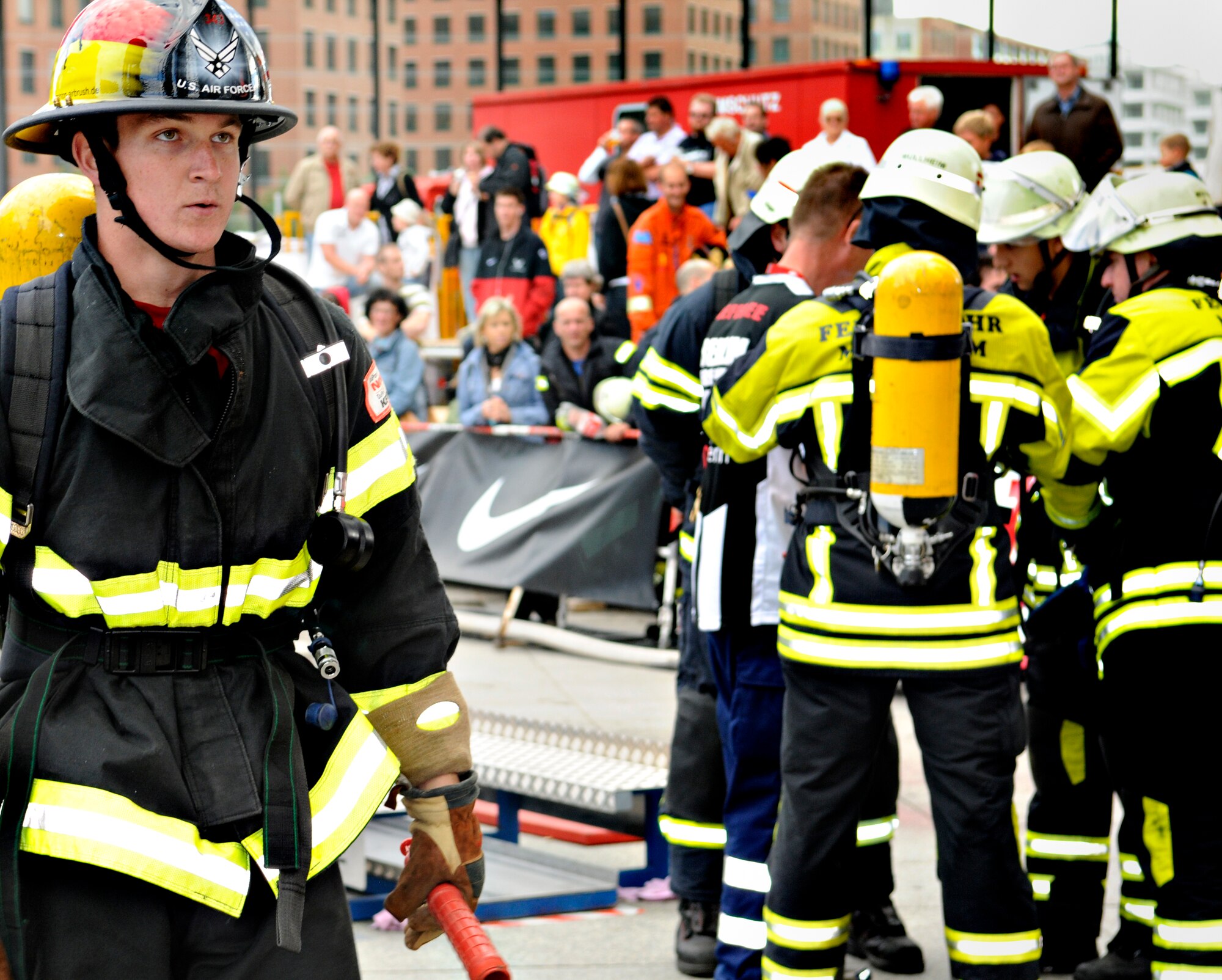 BERLIN – Airman 1st Class Mitchel Blackwell, 52nd Civil Engineer Squadron firefighter, stands ready to run as part of a five-man relay during the fourth Berlin Firefighter Combat Challenge Sept. 3. Airman Blackwell was part of Team Spangdahlem, which finished its first relay with a time of 1 minute, 48 seconds, placing third in the qualifying round. (U.S. Air Force photo/Staff Sgt. Benjamin Wilson)