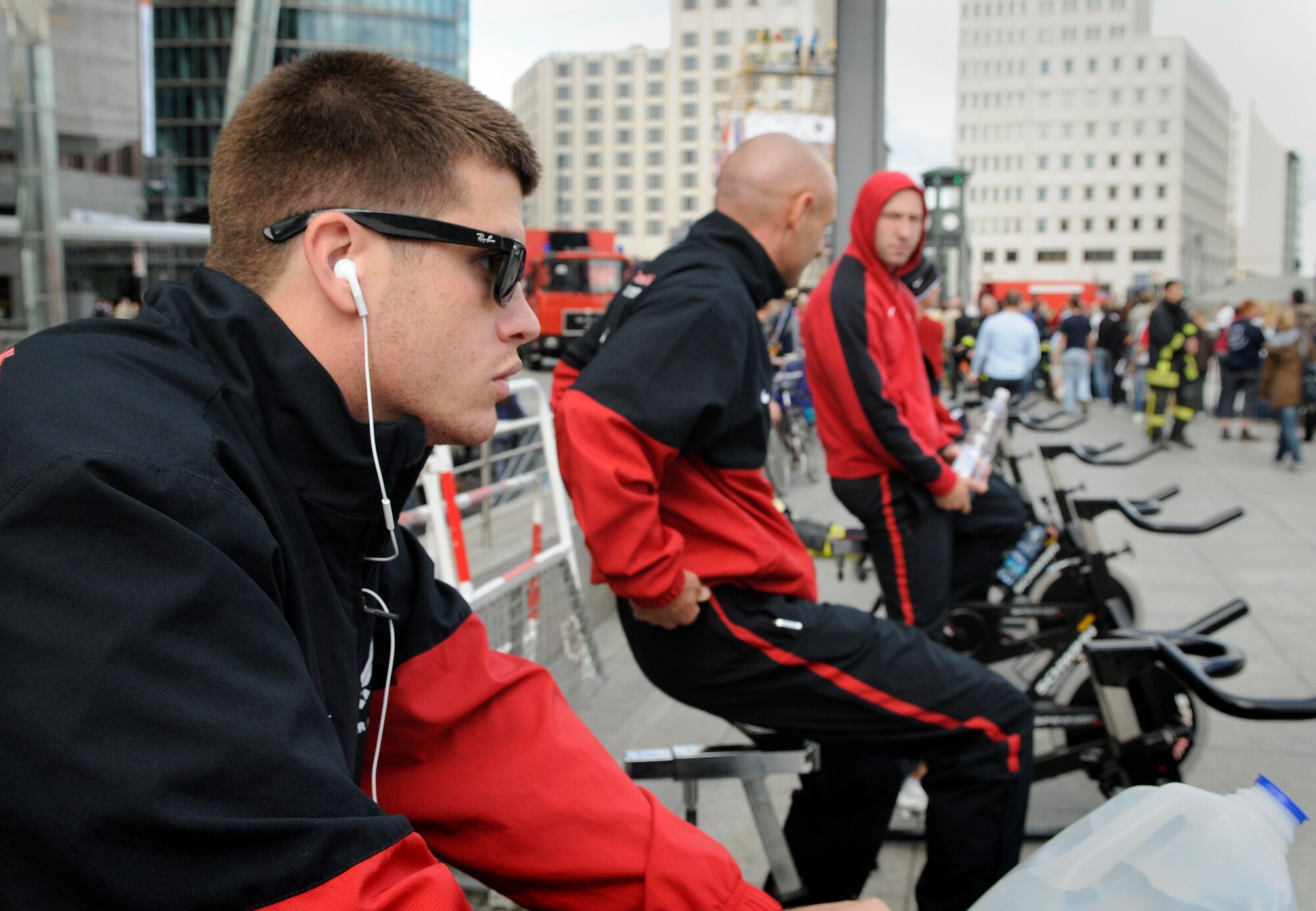 BERLIN – Airman Tyler Lamberson, 52nd Civil Engineer Squadron firefighter, warms up on an exercise bike before racing in the fourth Berlin Firefighter Combat Challenge Sept. 3. The Berlin FFCC consists of an obstacle course specifically designed to test the physical abilities of a firefighter. (U.S. Air Force photo/Staff Sgt. Benjamin Wilson)
