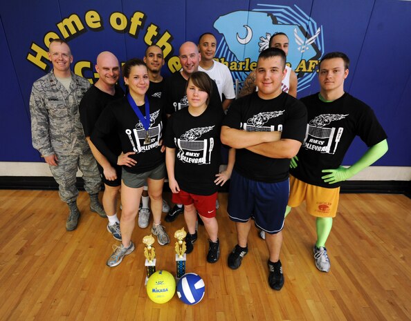 The 437th Aircraft Maintenance Squadron volleyball team poses after winning the title of Joint Base Charleston intramural volleyball champions at the Joint Base Charleston intramural volleyball championship game between the 437th Aircraft Maintenance Squadron and the 628th Civil Engineer Squadron at the Fitness and Sports Center Sept. 8, 2010, on Joint Base Charleston, S.C. (U.S. Air Force photo/Senior Airman Timothy Taylor)