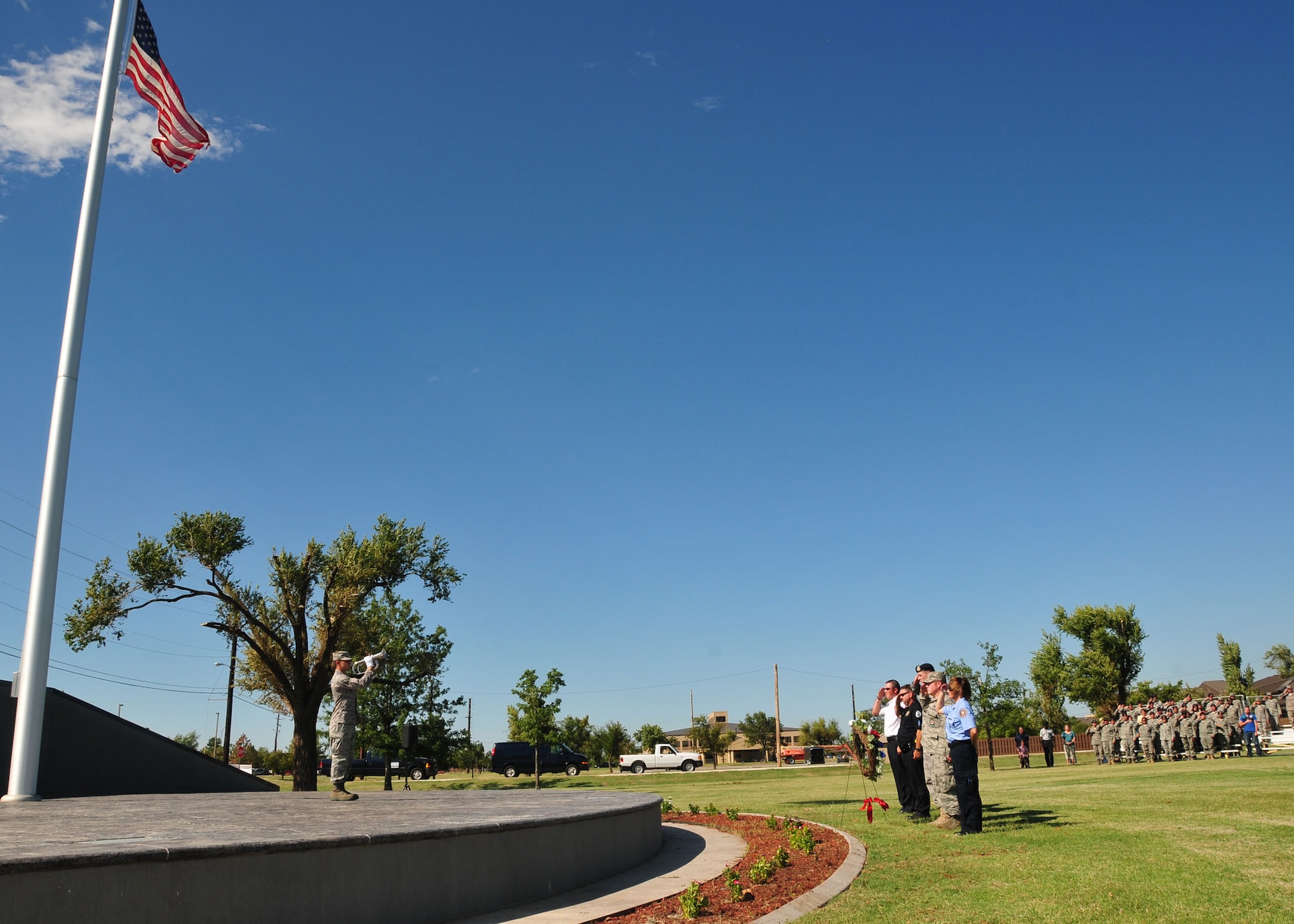 ALTUS AIR FORCE BASE, Okla. -- Members from local emergency services alongside Altus AFB first responders present a wreath during a September 11th memorial ceremony and formation at the Wings of Freedom Park on 10 Sept. (U.S. Air Force photo by Master Sgt. Brian M. Boisvert/ Released 97th Air Mobility Wing Public Affairs)
Add a caption
ALTUS AIR FORCE BASE, Okla. -- Members from local emergency services alongside Altus AFB first responders present a wreath during a September 11th memorial ceremony and formation at the Wings of Freedom Park on 10 Sept.  (U.S. Air Force photo by Master Sgt. Brian M. Boisvert/ Released 97th Air Mobility Wing Public Affairs)
