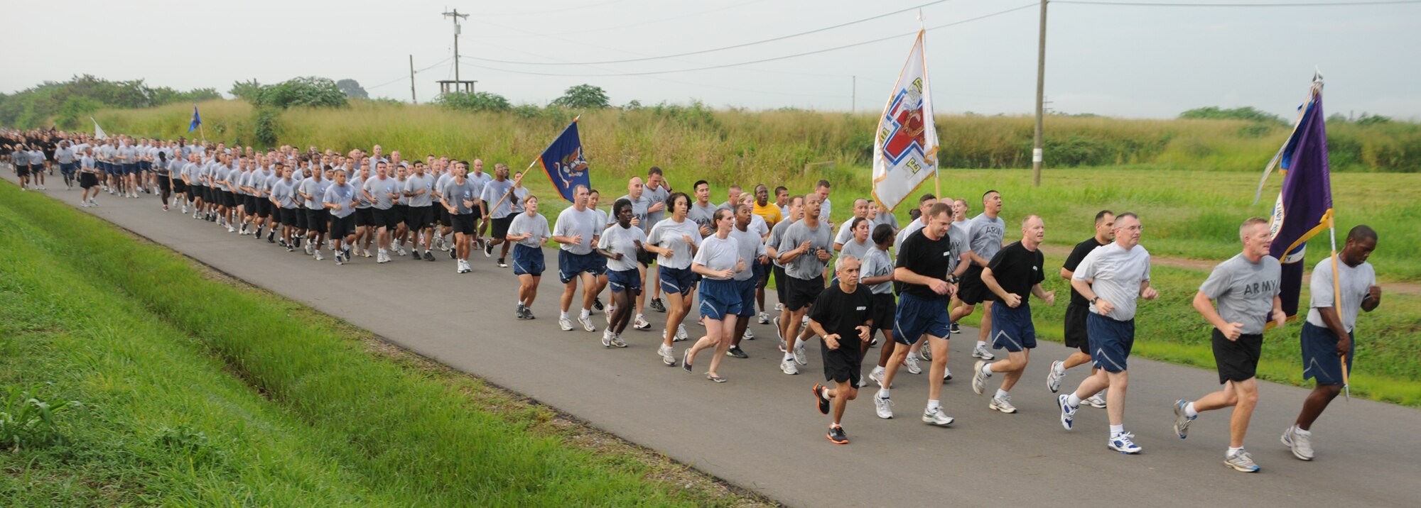 SOTO CANO AIR BASE, Honduras --  Team Bravo runners hit a straight-away as they near the completion of the Joint Task Force-Bravo Run here Sept. 10. (U.S. Air Force photo/Tech. Sgt. Benjamin Rojek)