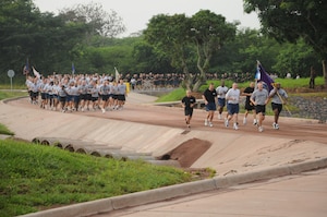 SOTO CANO AIR BASE, Honduras --  Team Bravo winds around a base road here during the Joint Task Force-Bravo Run on Sept. 10. The monthly run encourages esprit de corps and physical fitness. (U.S. Air Force photo/Tech. Sgt. Benjamin Rojek)
