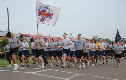 SOTO CANO AIR BASE, Honduras --  Members of the Medical Element follow their guidon bearer during the Joint Task Force-Bravo Run here Sept. 10. (U.S. Air Force photo/Tech. Sgt. Benjamin Rojek)