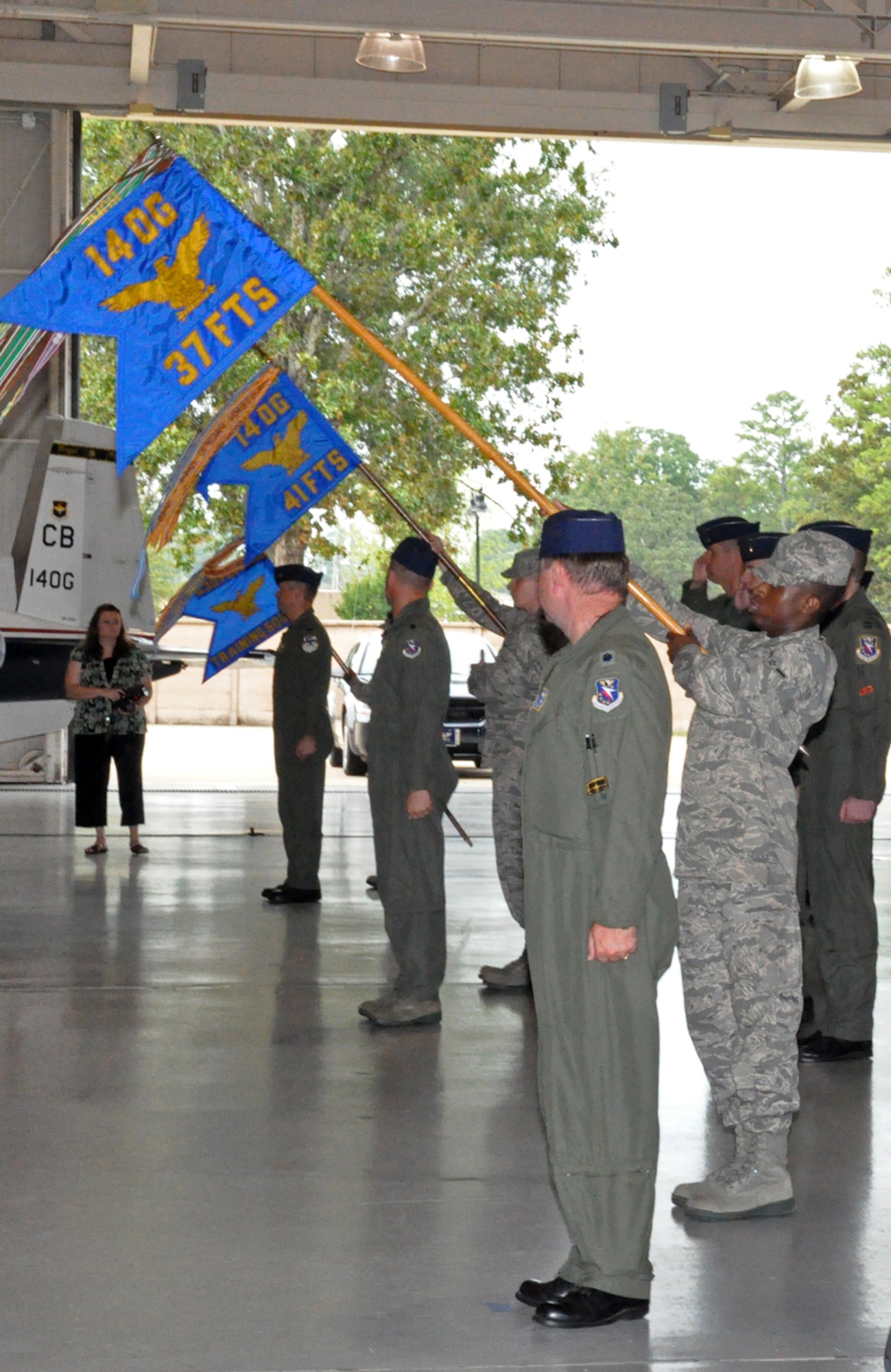 The men and women of the 14th Operations Group offer their first salute to their new commander, Col. Steven Stater, under the guidance of 14th OG Deputy Commander Lt. Col. Robert Mozeleski Sept. 8 at the BLAZE Hangar here. (U.S. Air Force photo/Staff Sgt. Jacob Corbin).