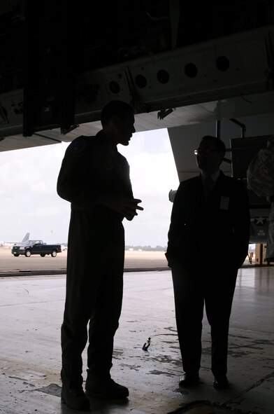 BARKSDALE AIR FORCE BASE, La. --  Col. Daniel Kosin, Air Force Global Strike Command, gives the Honorable Daniel B. Ginsberg, assistant secretary of the Air Force for manpower and reserve affairs, the new start modifications options brief during a B-52H Stratofortress static display Sept. 9. Mr. Ginsberg is responsible for providing overall supervision of manpower, military and civilian personnel, reserve component affairs and readiness support for the Department of the Air Force. (U.S. Air Force photo by Senior Airman Brittany Y. Bateman)(RELEASED)