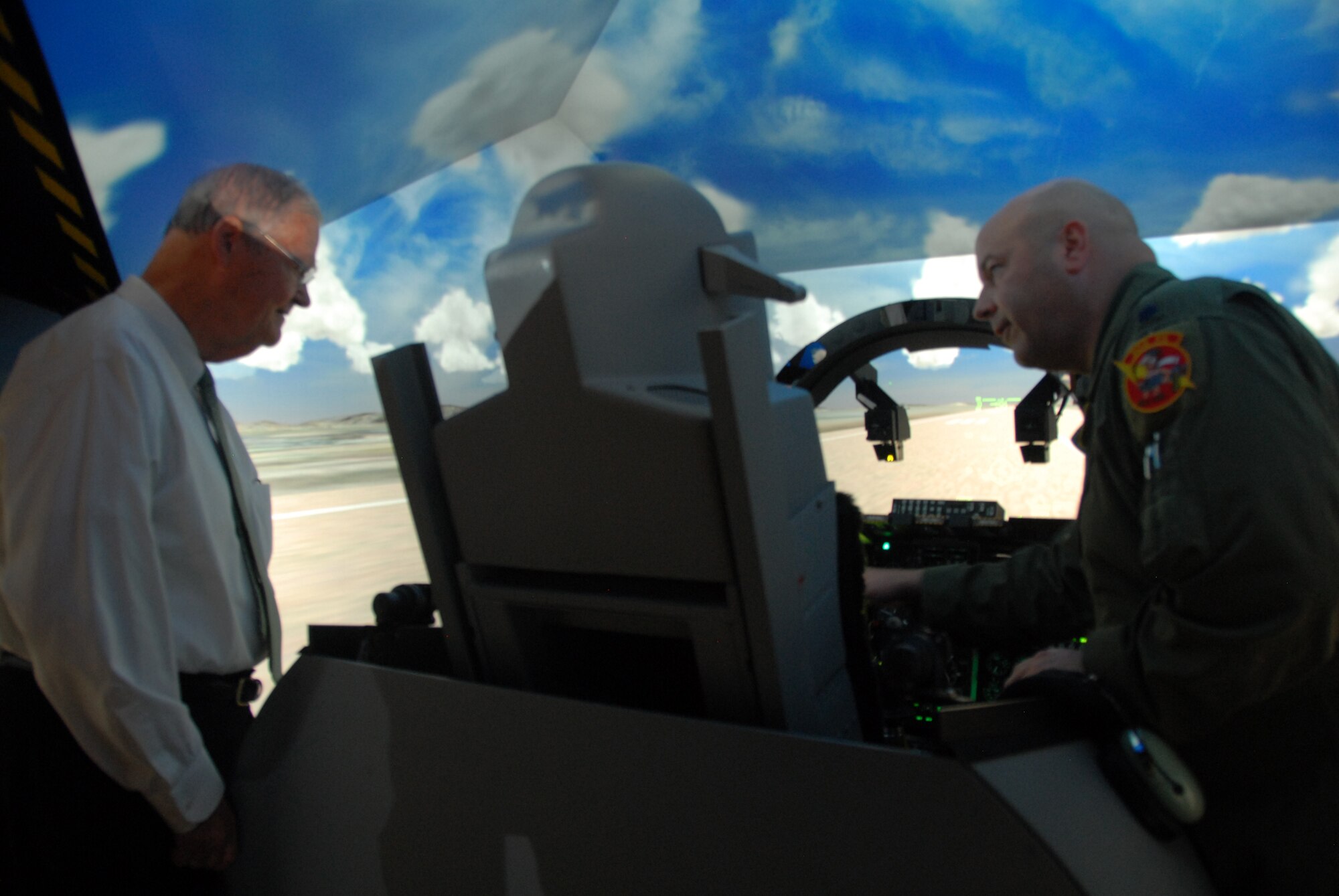 Congressman Ike Skelton discusses the 442nd Fighter Wing mission with Col. Mark Clemons and Lt. Col. Brian Borgen during a visit July 25, 2010. The 442nd FW is an A-10 Thunderbolt II Air Force reserve unit at Whiteman Air Force Base, Mo. (U.S. Air Force photo/Senior Airman Danielle Wolf)