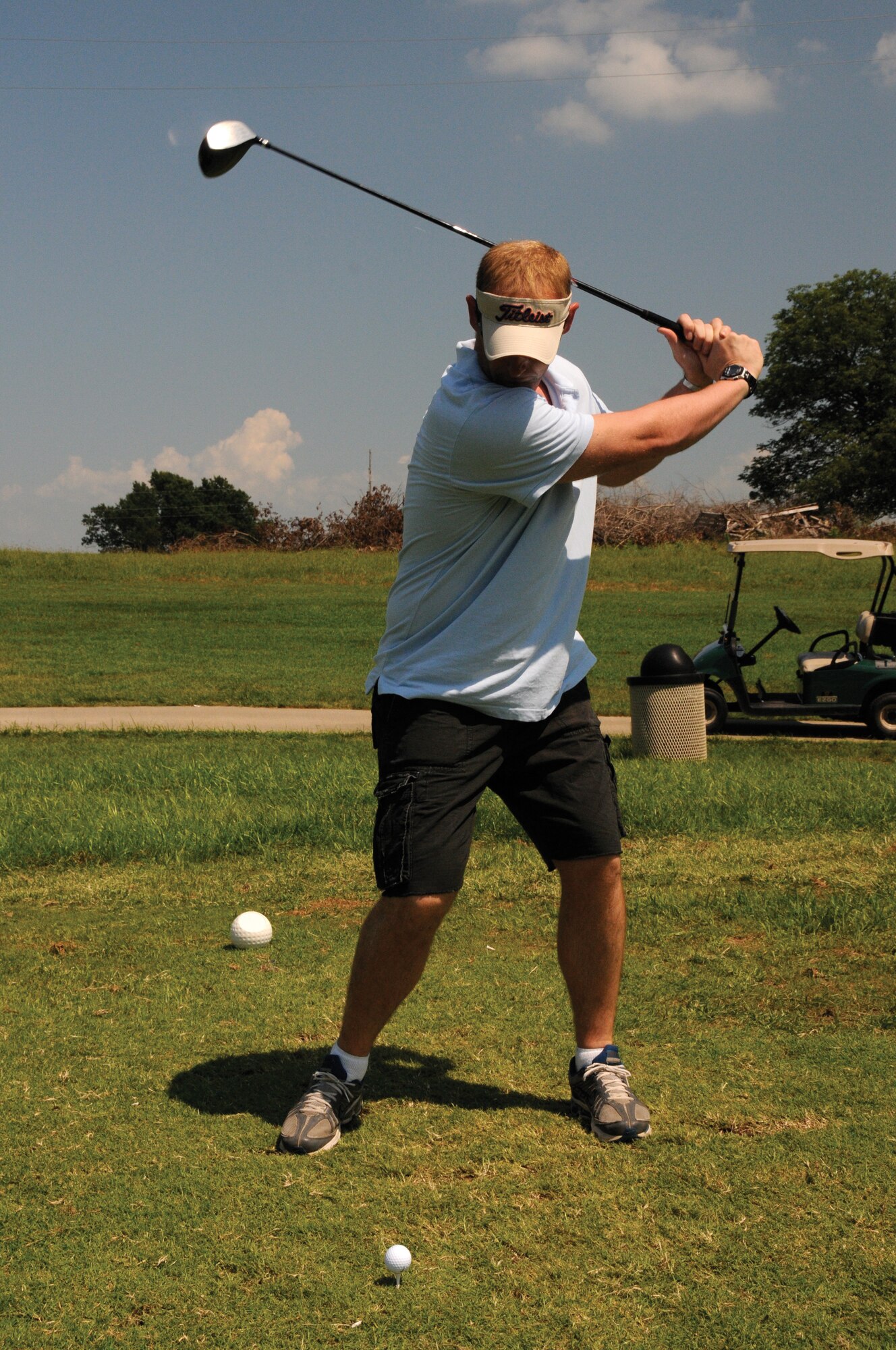 Capt. Rick Mitchell, formerly of the 303rd Fighter Squadron tees off during the Wright Flight Golf Tournamend during the August unit training assembly. The 303rd FS is part of the 442nd Fighter Wing, an A-10 Thunderbolt II Air Force Reserve unit at Whiteman Air Force Base, Mo. (U.S. Air Force photo by Staff Sgt. Tom Talbert)
