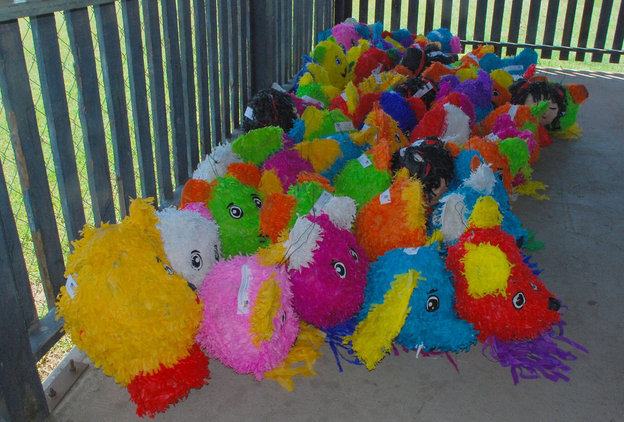 SOTO CANO AIR BASE, Honduras --  Team Bravo members filled up and deliverd piñatas to local school representatives Sept. 8 here. Coordinated by Civil Affairs here, the piñata gifts are in honor of Honduras' Childrens Day, which takes place Sept. 10. (U.S. Air Force photo/Martin Chahin)