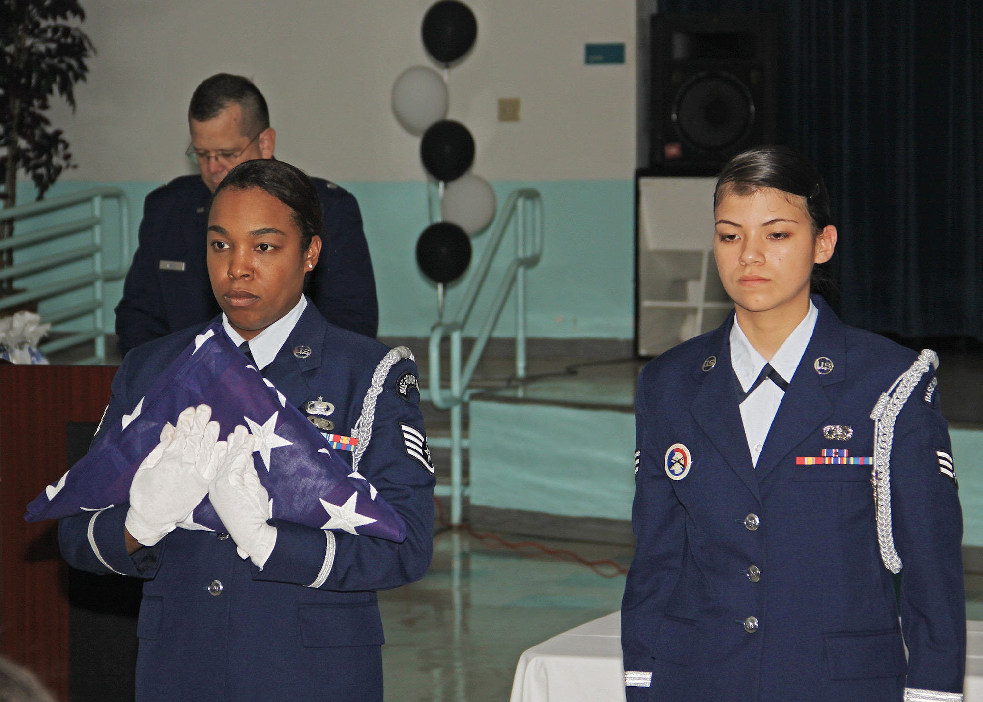 Members of the 482nd Fighter Wing take part in the First Inaugural Joint Uniform Military Prep Program at the Homestead Job Corps Center, Homestead, Fl., Sep. 8. The J.U.M.P. mission is to recruit and develop employable young men and women to become leaders and good citizens while at the Homestead Job Center and beyond. J.U.M.P. teaches physical fitness, leadership, acedemics, community service and instills the ideals based on U.S. Military disciplines and values. From left to right: Lt. Col. Thomas Davis, 482nd FW Public Affairs, Staff Sgt.Tara Austin and Senior Airman Patricia Trimble, 482nd FW Honor Guard. (U.S. Air Force photo/Tech Sgt. Ian Carrier)