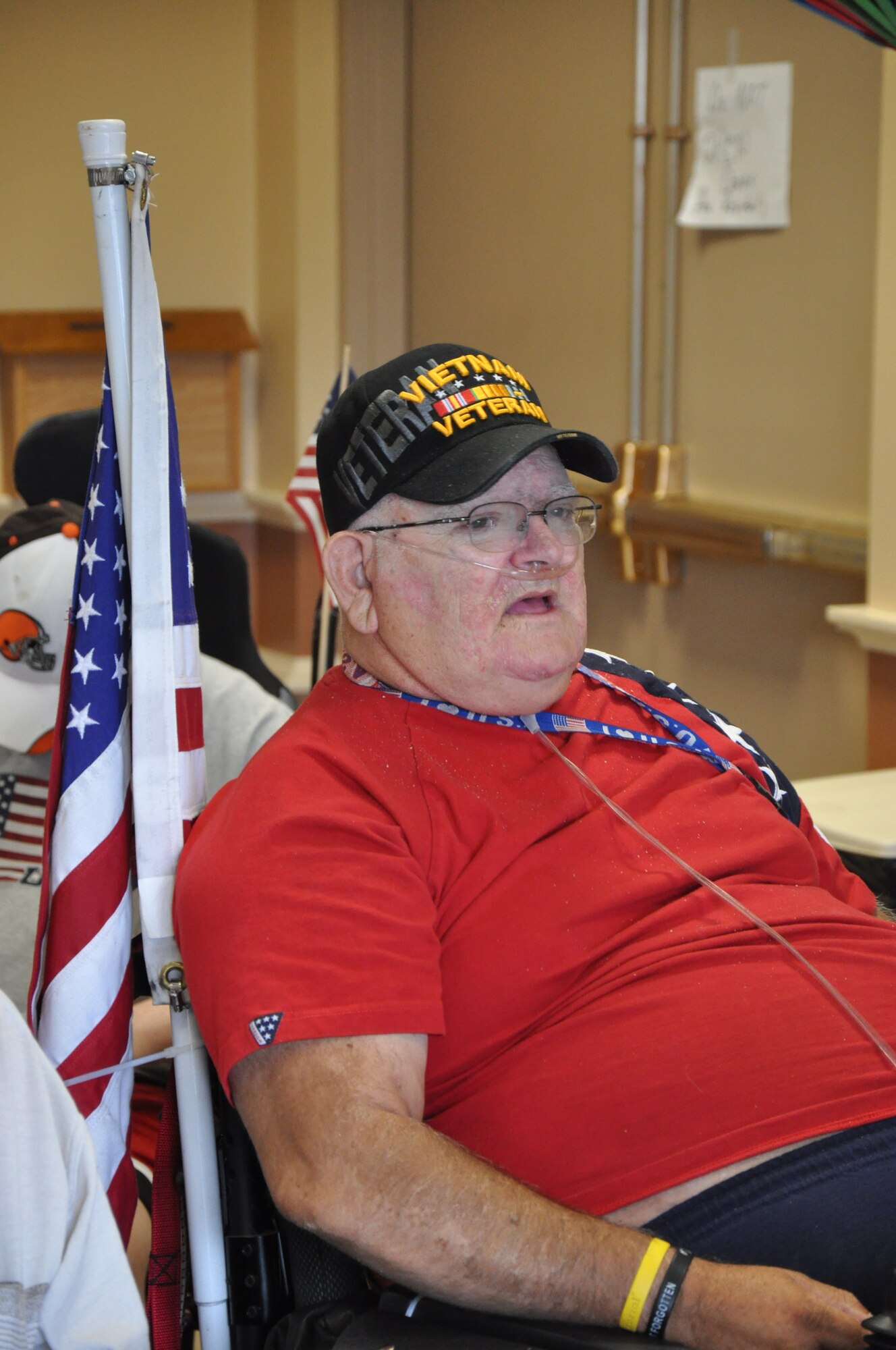 Richard Morissette shows his patriotism during the Top Three sponsored visit to Cheyenne’s Veteran’s Affairs Medical Clinic on Sept. 2. He was one of 20 veterans who were visited by Warren members. (U.S. Air Force photo by Dan Gage)  