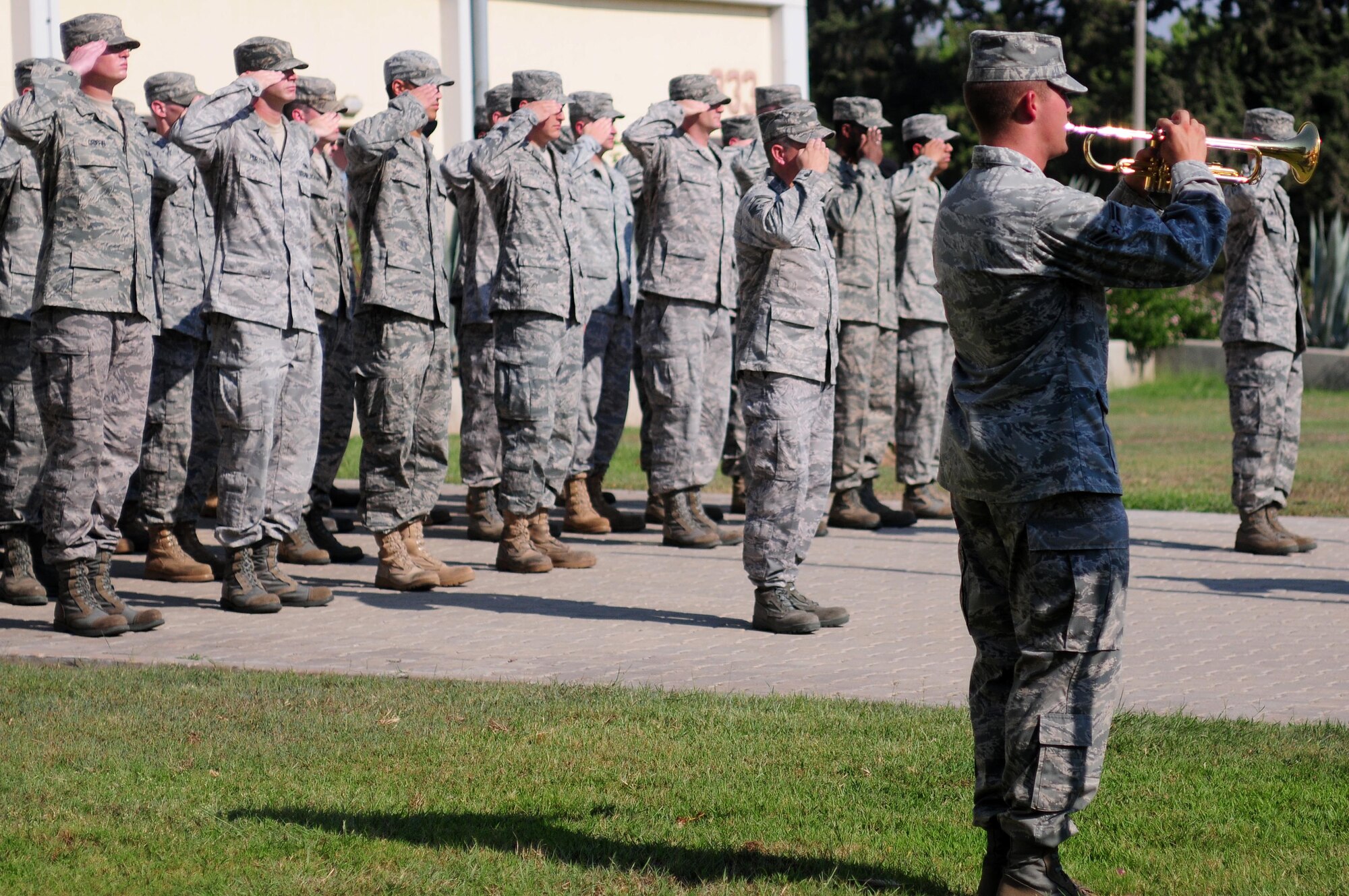 Airman 1st Class Johnathan Loftus, 39th Communications Squadron, plays taps during a Patriot Day retreat ceremony Sept. 10, 2010 at Incirlik Air Base, Turkey.  The ceremony recognized the service of first responders and included a moment of silence and taps to honor those who lost their lives during the Sept. 11 attacks.  (U.S. Air Force photo by Senior Airman Ashley Wood/Released)