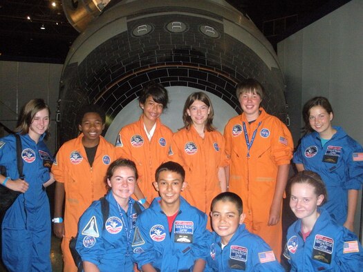 Emily Berg, 13, along with a few of her other teammates pose for a group photo after graduating from the United States Air Force Space Program in Huntsville, Ala. July 30. They attended the weeklong Star Wars-themed camp learning about leadership, teamwork and integrity as they explored stars, galaxies and solar systems. (courtesy photo)