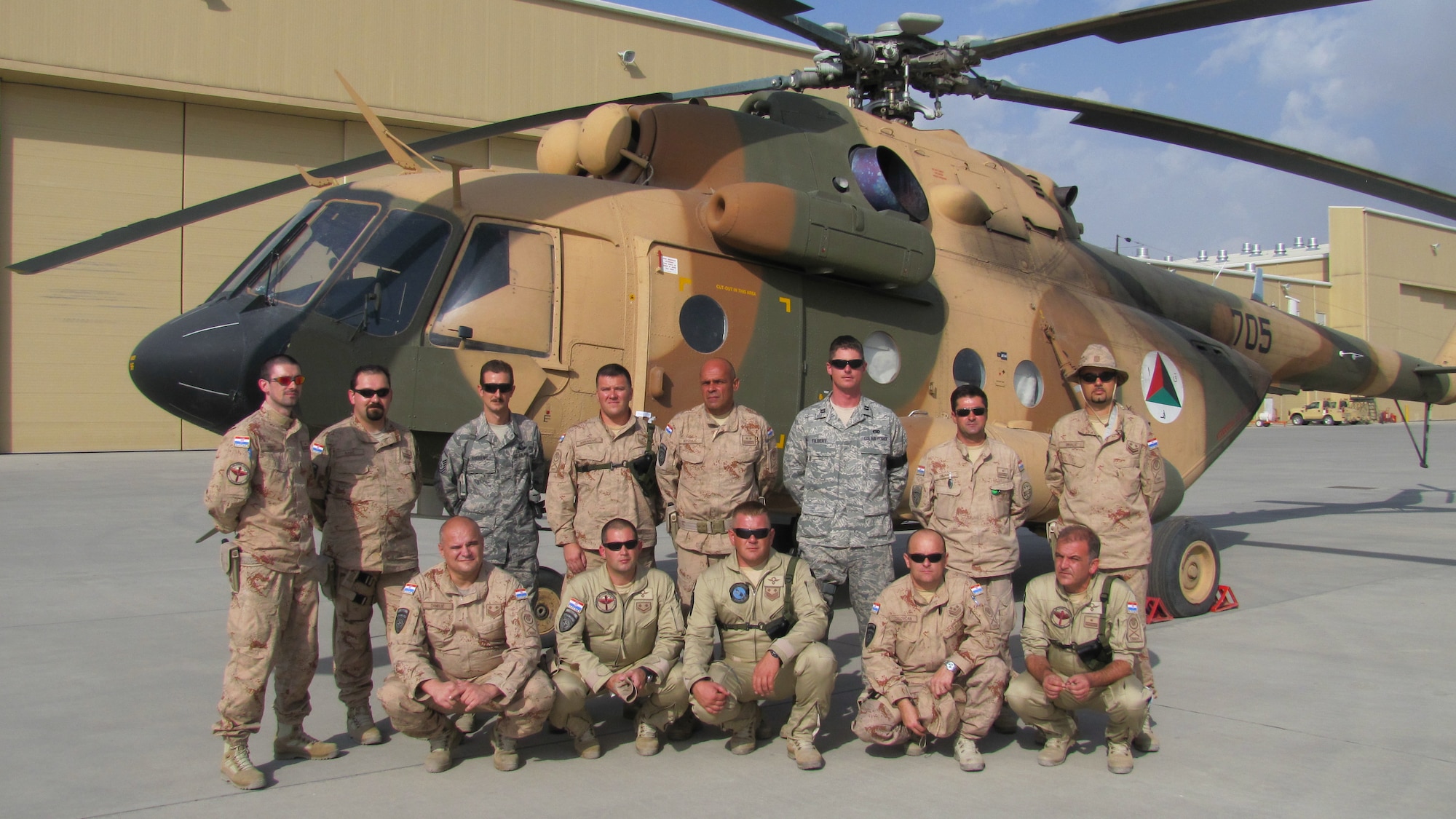 Members of the Croatian Air Force and NATO Air Training Command pose for a photo at the Afghan Air Force Base in Kabul, Afghanistan on Sept. 9, 2010.
