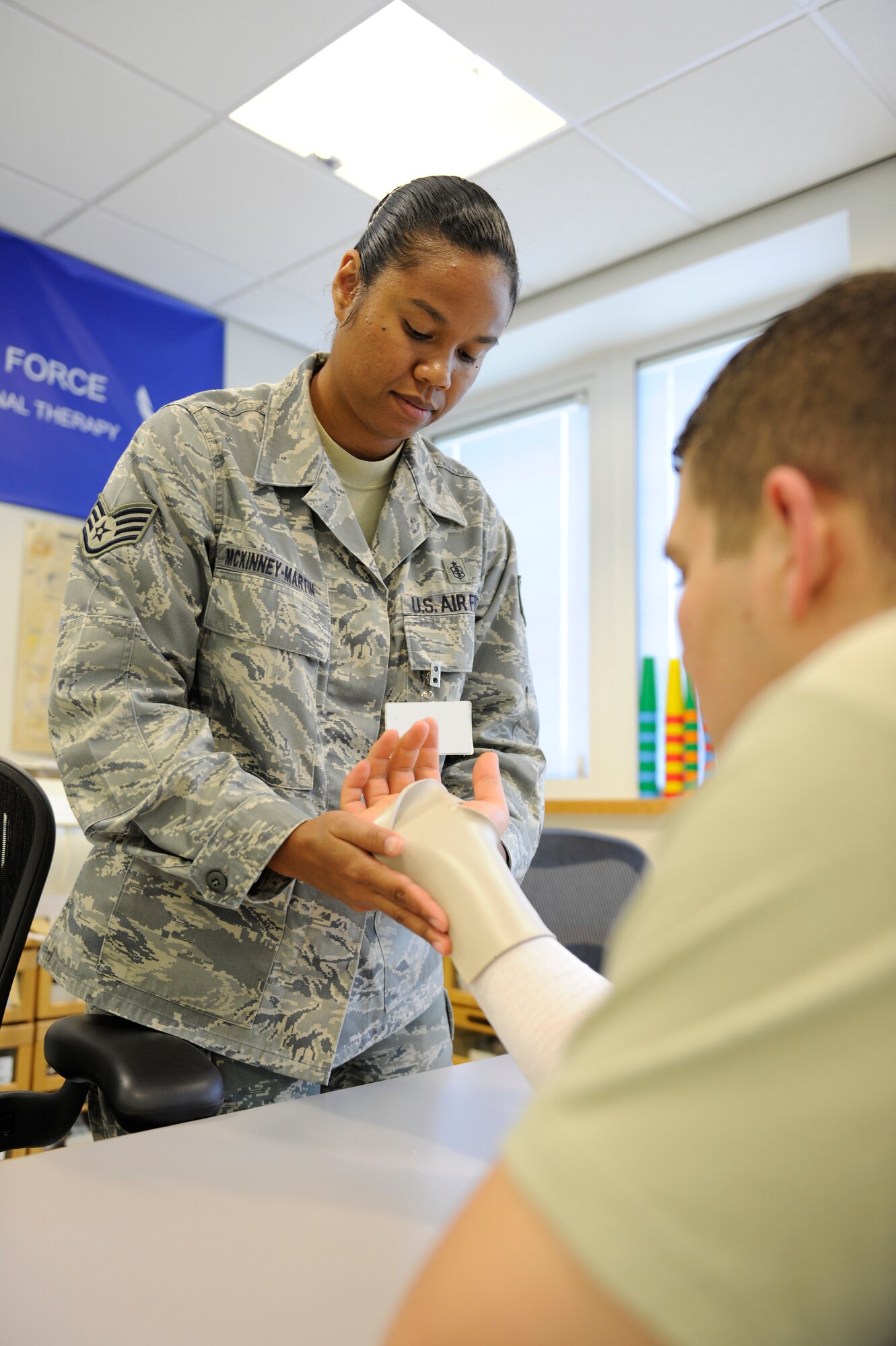 ROYAL AIR FORCE LAKENHEATH, England -- Staff Sgt. Maybelle McKinney-Martin, 48th Medical Operations Squadron Physical and Occupational Therapy NCO in-charge, creates a customized splint for a patient Sept. 9, 2010. Sergeant McKinney-Martin was nominated for a liberty spotlight because she portrays the core value of ‘Service Before Self’. (U.S. Air Force photo/Airman 1st Class Eboni Knox)