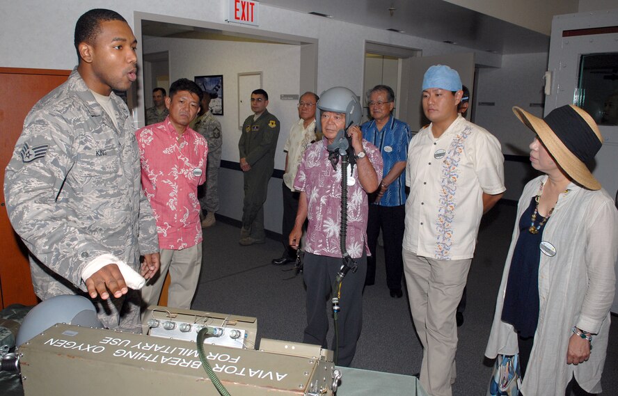 Staff Sgt. Shaun King, from the 18th Aerospace Medicine Squadron, provides a briefing to local citizens during the Kadena Co-Commanders' tour Sept. 10. Dozens of Co-Commanders' visited the base and received a tour of its facilities to better familiarize them with Kadena's operations and people. (U.S. Air Force Photo/Junko Kinjo) 