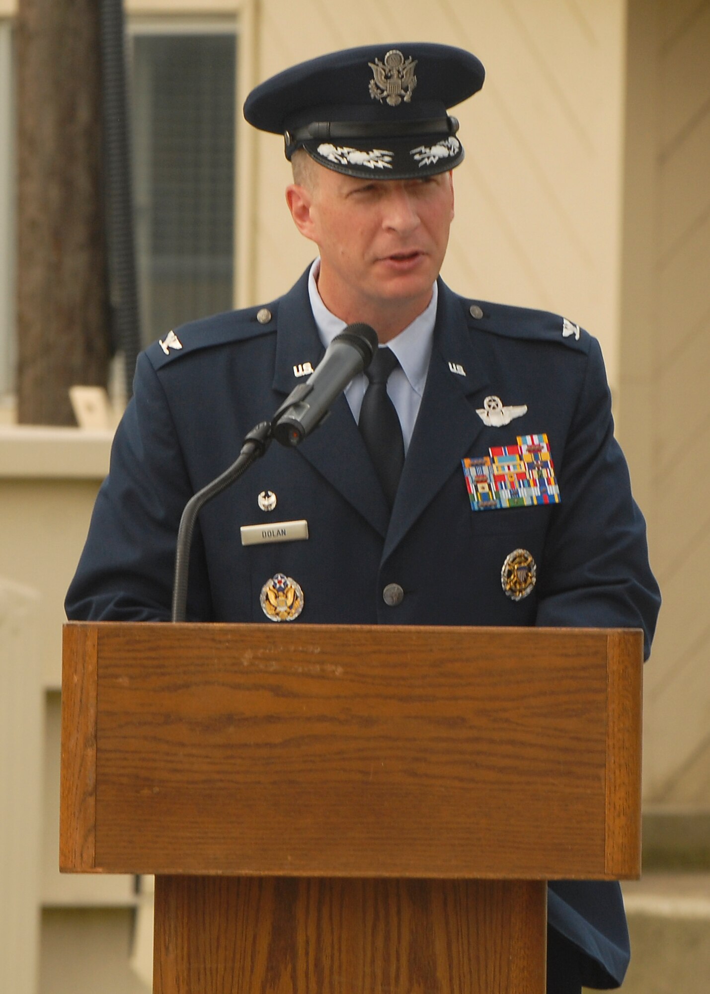 KUNSAN AIR BASE, Republic of Korea -- Col. John Dolan, 8th Fighter Wing commander, speaks to Wolf Pack Airmen attending the Sept. 11 Patriot Day Remembrance Ceremony here Sept. 10. The ceremony was in honor of the victims from Flights 11, 175, 77, 93, the Pentagon, the World Trade Center North and South tower employees, and emergency service workers, who were killed in the events in America Sept. 11, 2001. (U.S. Air Force photo/Senior Airman Ciara Wymbs) 