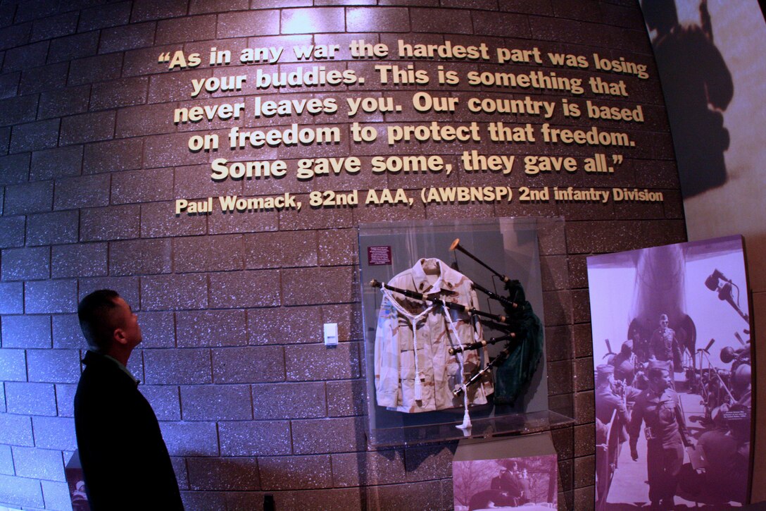 Sgt. Than Naing, an infantryman stationed with Wounded Warrior Battalion East in Camp Lejeune, N.C., tours the National Purple Heart Hall of Honor here Sept. 10.  Naing recently survived a gunshot wound to the chest during his tour in Afghanistan as a squad leader with Company I, 3rd Battalion, 6th Marine Regiment, earning his second Purple Heart in four years. An immigrant to New York City from Rangoon, Burma in 1997, Naing joined the Marine Corps in 2004, earning his U.S. citizenship shortly thereafter.