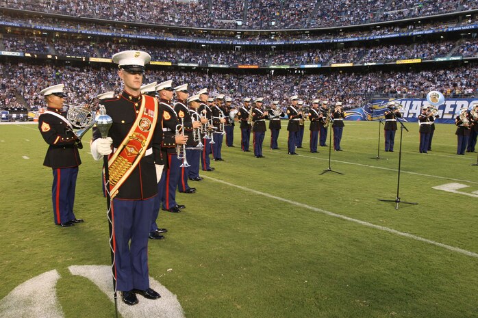 The 3rd Marine Aircraft Wing Band performs during a military appreciation halftime show at Qualcomm Stadium