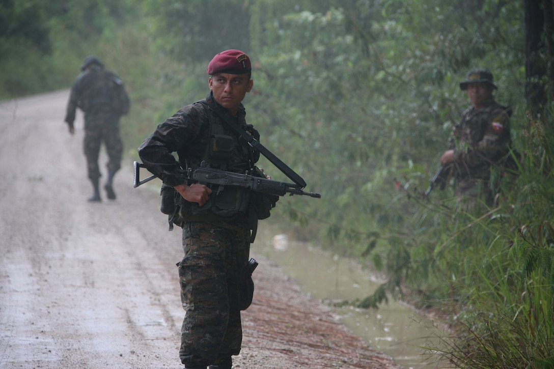 Guatemalan Army Special Forces soldiers or "Kaibiles" prepare to set up an ambush exercise for U.S. Marines at Poptun Training Camp in Poptun, Guatemala, Sept. 12.  Ambushing was part of a larger training package created by the Kaibil soldiers to give Marines of Special-Purpose Marine Air-Ground Task Force Continuing Promise 2010 a sense of how the elite Guatemalan Special Forces soldiers train on a daily basis.