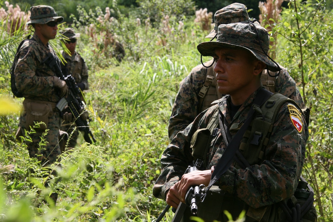 A Guatemalan Army Special Forces soldier or "Kaibil" leads U.S. Marines of Special Purpose Marine Air-Ground Task Force Continuing Promise 2010 on a jungle patrol exercise at Poptun Training Camp in Poptun, Guatemala, Sept. 11.  From Sept. 5-12, Marines of Special-Purpose MAGTF Continuing Promise 2010 conducted a subject-matter expert exchange with Kaibil soldiers to give the Marines a sense of how the elite Guatemalan Special Forces soldiers train on a daily basis.